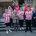 The successful Derry City Down Syndrome Futsal champions pictured with the Mayor, Grace ui Niallais, their coaches and some of their parents at the Guildhall on Tuesday afternoon.