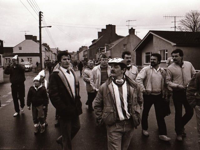 Players, club officials and staff and fans as Derry City FC face Finn Harps FC at Ballybofey in their first league meeting.