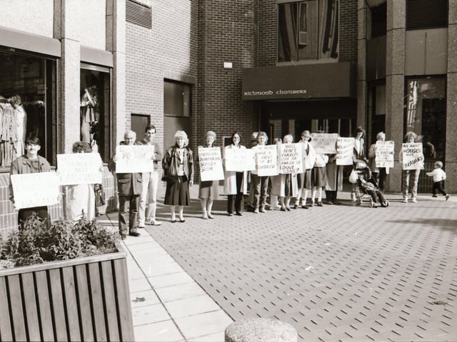 Dove Gardens residents protest at the Housing Executive in the Diamond.