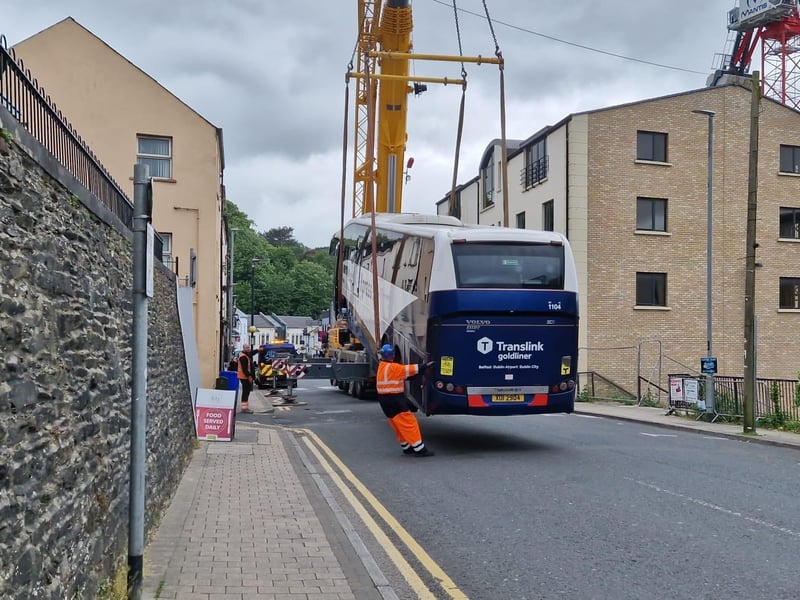 The coach being lifted by the crane at the Spencer Road/ Fountain Hill junction.