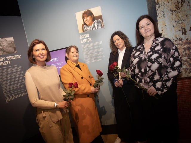 Celebrating International Women's Day at the Gasyard Centre on Tuesday are, from left, Jayne Quigg, manager, DHCT, Eileen Allen, chair, DHCT, Linda McKinney, manager, Gasyard Development Trust and Maureen Collins, beside the portrait of the late Roisin Barton.