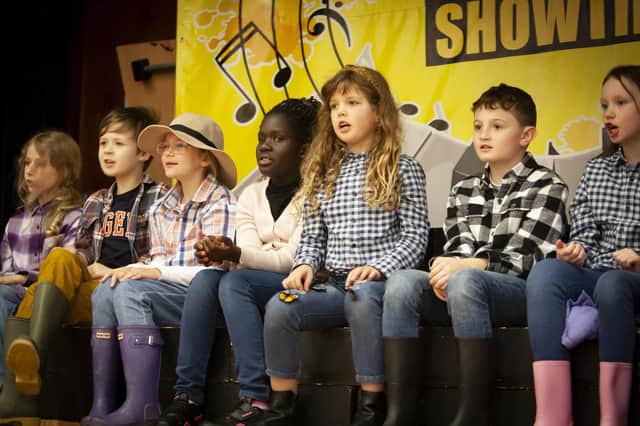 A section of the Primary 5 pupils performing on stage for the Mayor, Sandra Duffy during her visit this week to the Model PS.