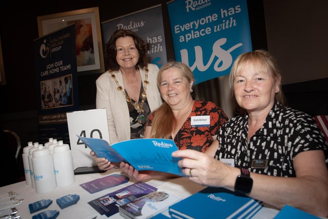 Radius Housing's Antoinette Strawbridge and Thelma Moore showing Mayor Patricia Logue some of the work Radius carry out around the city and district, at Tuesday's Derry Job Fair in the City Hotel.
