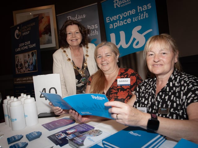 Radius Housing's Antoinette Strawbridge and Thelma Moore showing Mayor Patricia Logue some of the work Radius carry out around the city and district, at Tuesday's Derry Job Fair in the City Hotel.