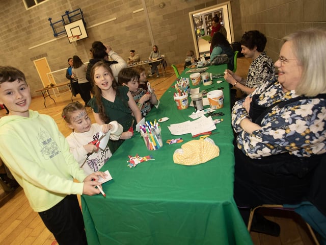 Local children taking part in the Arts and Crafts at Saturday's 'Christmas Get Together'. : .
