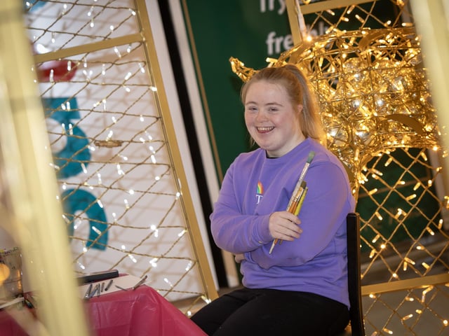 A BIG SMILE!. . . .A big smile from the lovely Tori McNeill as she starts her work at Lisnagelvin Shopping Centre on Wednesday afternoon.