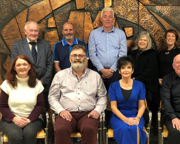 Derry Credit Union Board of Directors. Seated left to right are newly elected Treasurer Carmel Bradley, outgoing President Sean Hegarty, Secretary Patricia Doherty, and newly elected President Colm McCauley.  Standing left to right are Directors Leo Simpson, Arthur Duffy, Laurence Arbuckle, Brigid McCarron, Jennifer Turner and CEO Joan Gallagher. Not pictured, Vice President Delma Boggs and Director Rosemary O’Doherty.