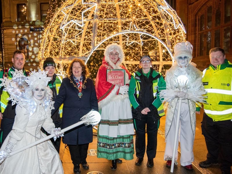 Local volunteers with the Mayor Patricia Logue and Christmas characters. Martin McKeown