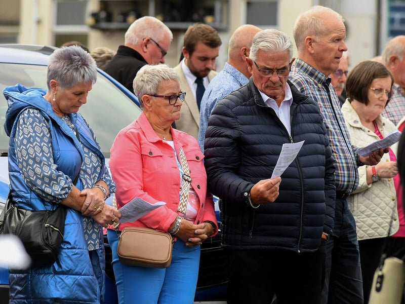 People gather for a service in Claudy marking the 52nd anniversary of the car bombings that killed nine people and injured 30 others. Photo: George Sweeney