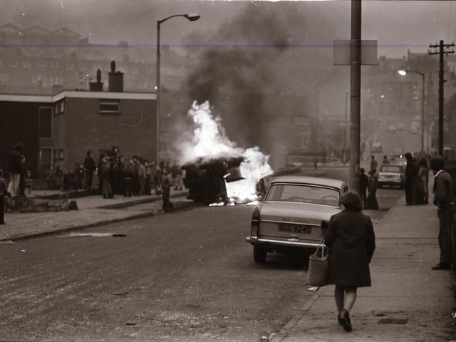 The aftermath of rioting in Derry during which the Post Office sorting office was burnt down.