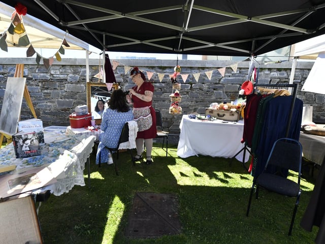 Recreating hair styles and fashion from the 1940’s in Ebrington square on Saturday during a commemoration of BOA80. Photo: George Sweeney