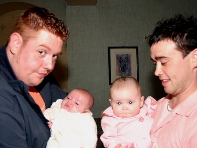 Dad Ciarian with Niamh Orla and Leah and Ronan getting to know each other at the party. 9349dd : Derry Parties & Celebrations October 2005: Baby McClean.