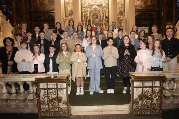 Pupils from Nazareth House Primary School who received the Sacrament of Confirmation from Fr. Chris McDermott at Long Tower Church on Thursday evening last. Included are Fr. Gerard Mongan and Fr. Stephen Ward. On left, Mrs Julia Cooke and Ms Joanne Dixon. On right Mr Adam Doherty (student teacher), Mrs Emma Courtney and Ms Maureen Clark and Mrs. Roisin Blackery, Principal.  (Photos: Jim McCafferty Photography)