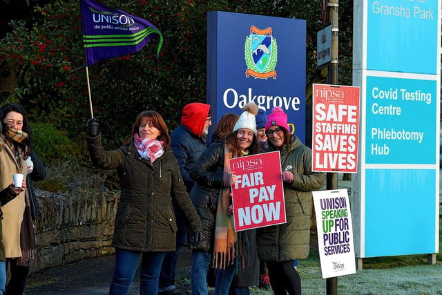 Striking health and social care workers picket outside Gransha on Monday morning. Photo: George Sweeney. DER2250GS – 08