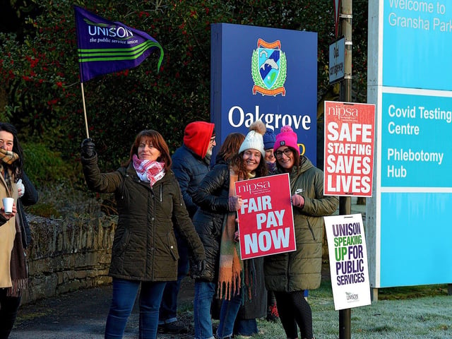Striking health and social care workers picket outside Gransha on Monday morning. Photo: George Sweeney. DER2250GS – 08