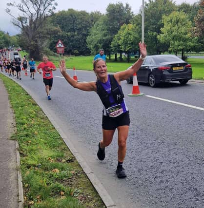Fran McFadden shows no concerns with the climb over Foyle Bridge that lay ahead of her at the Waterside Half Marathon