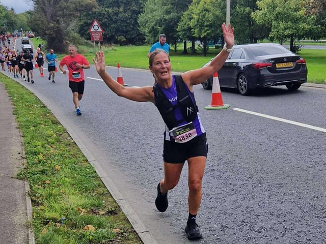 Fran McFadden shows no concerns with the climb over Foyle Bridge that lay ahead of her at the Waterside Half Marathon