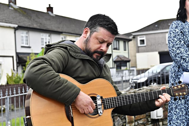 Ramon Ferguson performs at the Creggan Republican Monument during a commemoration on Easter Sunday afternoon. Photo: George Sweeney