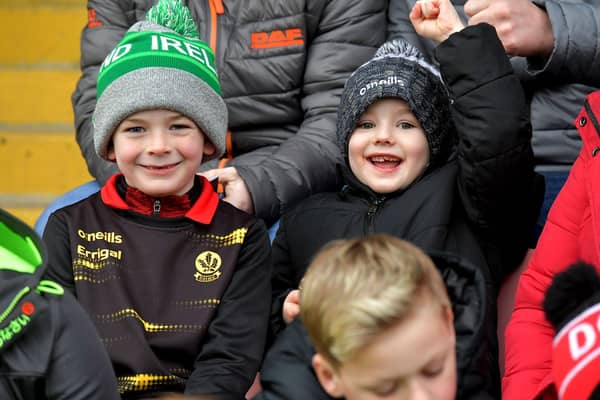 Two young Derry fans enjoy Saturday's dramatic victory over Dublin. Photo: George Sweeney. DER2309GS – 71