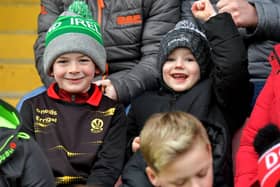 Two young Derry fans enjoy Saturday's dramatic victory over Dublin. Photo: George Sweeney. DER2309GS – 71