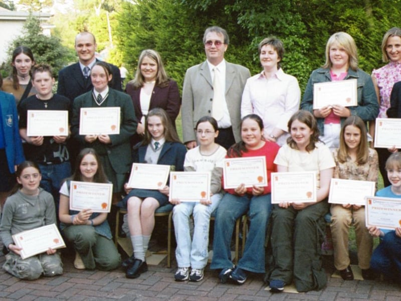 Some of the prizewinners in the Children in Crossfire writing competition were:- Bridget Mary Wilson, Christine Carson, Gemma Blair, Caroline Stephenson, Solanze McDaniel, Hannah-Chloe Magee, Mandy Hutchinson, Cathryn Elliot, Kevin Feeney, Nicole Berry, Richard Moore (Director, Children in Crossfire), Anne McCauley, Carrie McGowan, Kirsty Reilly, Danielle Blee, Sarah Lapsley, Pamela Adams and Jenny Nixon. 260603HG4