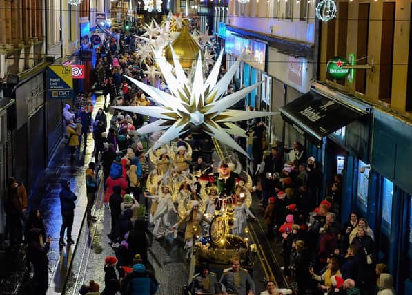 The colourful Derry Christmas procession passes through the city centre last year. Photo: George Sweeney. DER2248GS - 06