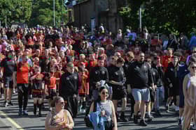 The 2024 Foyle Cup parade makes its way along Northland Road, towards Guildhall Square, on Monday morning.  Photo: George Sweeney