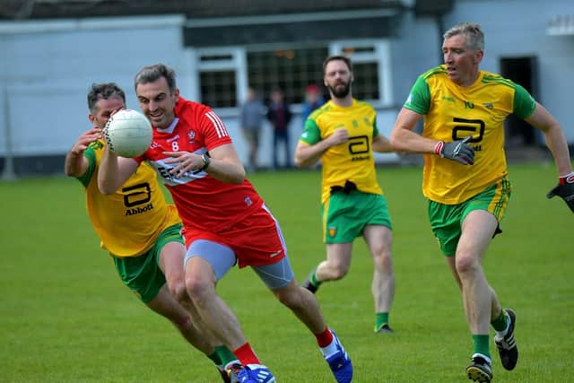 The Derry Masters’ Kevin McGuckin breaks forward during the game against Donegal Masters at O’Cahan Park on Saturday afternoon. Photo: George Sweeney. DER23118GS – 87