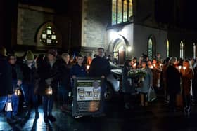 Relatives gather after mass at St Columba’s Church to take part in a wreath laying event, at Strabane Old Road, on the 50th Anniversary of the Annie’s Bar massacre on Tuesday evening. Photo: George Sweeney. DER2251GS – 11