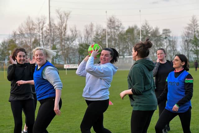 Action from Doire Trasna’s first Mothers and Others football practice session, at Corrody Road. Photo: George Sweeney. DER2316GS – 21