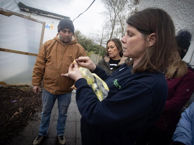 Sharon McMaster and Gareth Lamrock explaining the planting methods.