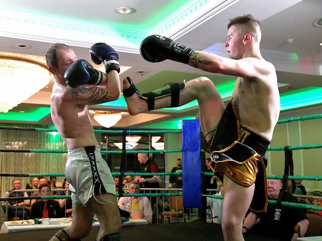 Rathmor Warrior’s Conal McBrearty (right) defeated CJ Silcock, Fightclub NI, to win the All Ireland 66kg K1 Title, on Saturday evening last, in the Everglades Hotel. Photo: George Sweeney. DER2312GS – 78
