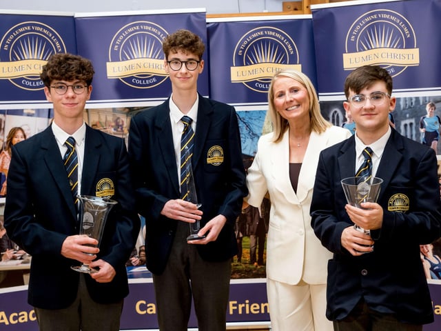 Mrs O’Hare congratulating some of the students who received awards for outstanding attendance.  Lumen Christi College.