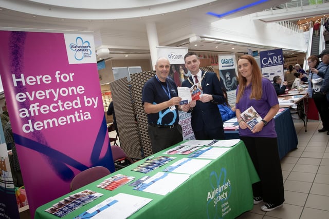 Marking World Alzheimer's Day at Foyleside Shopping Centre on Thursday during the DEEDS/OLT's 'One Stop Shop' for information on dementia are, from left, Howrad Clarke, Alzheimer's Society, the Deputy Mayor Jason Barr and Sabrina Lynch, Old Library Trust.