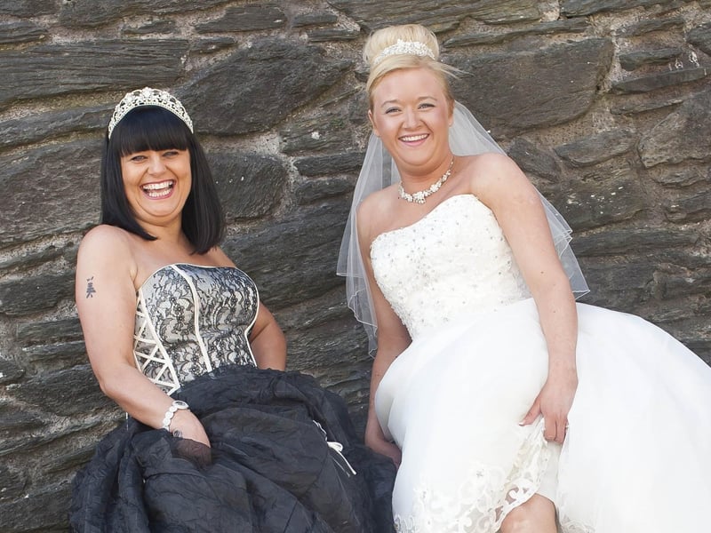 Orla McGillian, left and Laura McCallion, showing off their fancy footwear at the Brides Across The Bridge World Record. (3004-GMI-21)