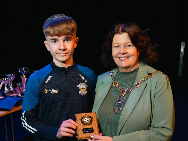 Derry City & Strabane District Council Mayor Patricia Logue making a presentation to Ollie McDaid, who won the D&D FA 2023 Player of the Year Award. Photo: Karol McGonigle, Milkwood Studios.