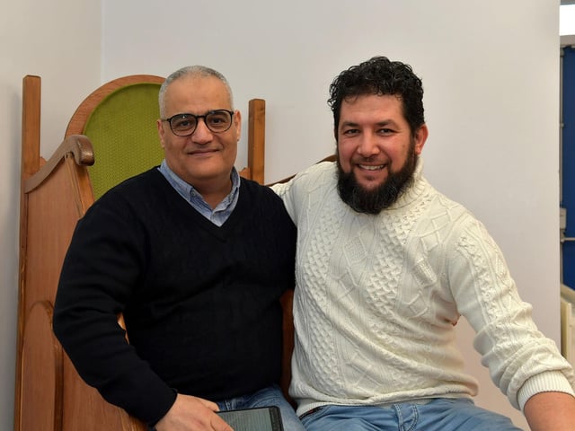 Mohamed Abou Samra with local businessman Mohamed Ali at the North West Islamic Association’s Tea and Tour day in Pennyburn on Sunday afternoon last. Photo: George Sweeney. DER2311GS – 07
