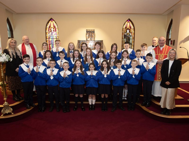 ST. PAUL'S PS CONFIRMATION. . . .Children from St. Paul's Primary School, Slievemore who received the Sacrament of Confirmation from Fr. Noel McDermott at St. Joseph's Church, Galliagh on Wednesday last. Included are Fr Michael McGaughey, PP, Fr. Sean O'Donnell, CC, Fr. McDermott, Ms. McGinty, P7 teacher and Ms. Niamh Dunlop classroom assistant. (Photos: JIm McCafferty Photography)