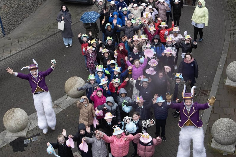 FEILE DERRY'S EASTER BONNET PARADE. . . .The Feile Derry's Easter Bonnet Parade makes its way towards Guildhall Square on Wednesday morning. Local schoolchildren took part in the parade from the Verbal Arts Centre, down the walls and into the square where the children received Easter eggs and refreshments. (Photos: Jim McCafferty Photography)