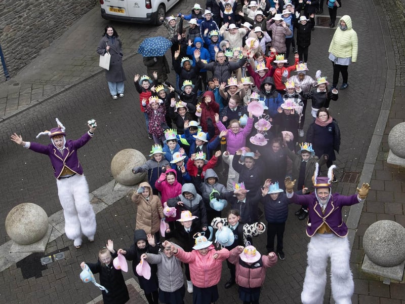 FEILE DERRY'S EASTER BONNET PARADE. . . .The Feile Derry's Easter Bonnet Parade makes its way towards Guildhall Square on Wednesday morning. Local schoolchildren took part in the parade from the Verbal Arts Centre, down the walls and into the square where the children received Easter eggs and refreshments. (Photos: Jim McCafferty Photography)