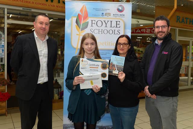 2023: Thornhill College pupil, Alannah Kelly was awarded First Place in the KS4 My Community category in the inaugural Foyle Schools Poetry Competition. Included in the photograph are Kevin Hippsley, manager of Creggan Enterprises, Jenni Doherty, Little Acorn Bookstore and Michael Withers, NI Executive Office (funder). Photo: George Sweeney.  DER2313GS – 43