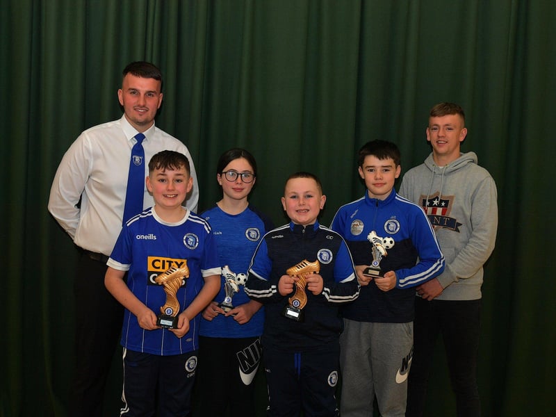 Most Improved Players from Trojans FC pictured with their awards, at the club’s annual prizegiving, alongside Diolain Ward Vice- Chairperson and Derry City’s Ciaron Harkin. Photo: George Sweeney