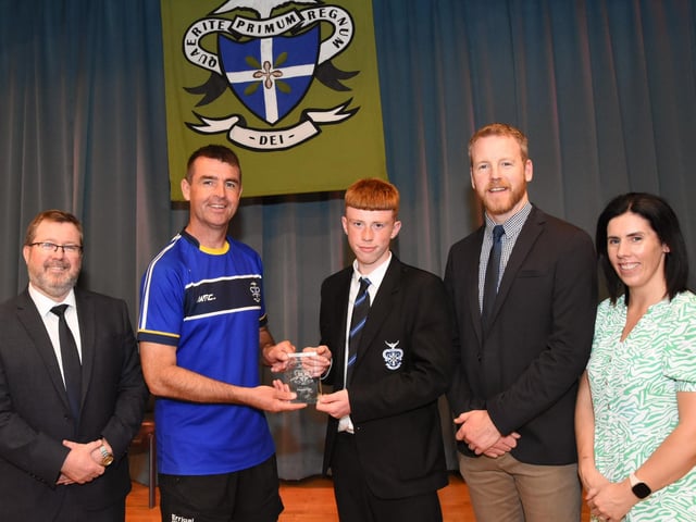 Year 10 Overall Sportsman of the Year 2022 2023 Cian Morrison, 10H pictured receiving his award from Mr. E. Burns, Head of PE. Included are Mr J Johnston, Acting Vice Principal, Mr G Millar, Year Head and Mrs D Duffy, Senior Teacher.
