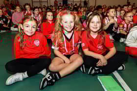 Pupils from Holy Family Primary School pictured during the visit from Derry City Conor Barr and Paul McMullan on Wednesday afternoon. Photo: George Sweeney