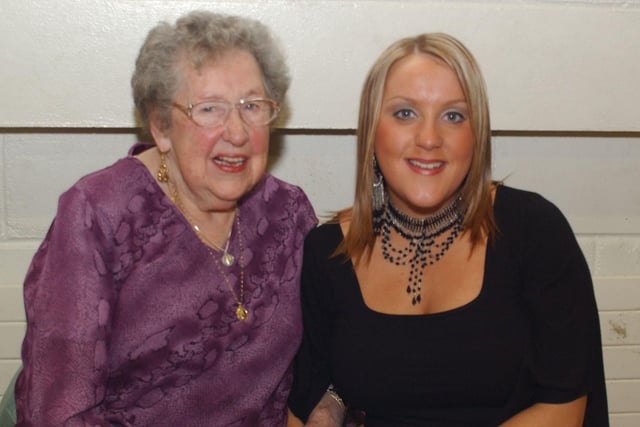 Phoebe Doherty with her granddaugther in Derry at her 90th birthday party. (2502CG09)