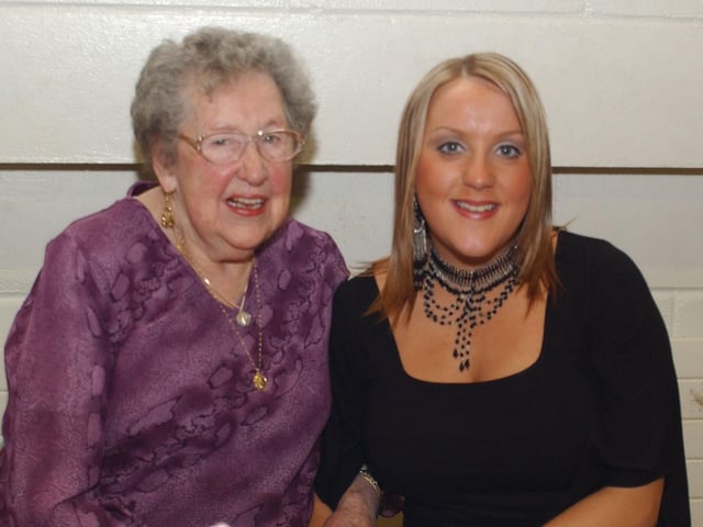 Phoebe Doherty with her granddaugther in Derry at her 90th birthday party. (2502CG09)