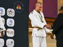 Aedan O'Doherty from Derry's Konarakai Judo Club receives his gold medal at the recent Commonwealth Judo Tournament in Port Elizabeth, South Africa.