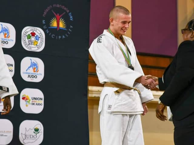 Aedan O'Doherty from Derry's Konarakai Judo Club receives his gold medal at the recent Commonwealth Judo Tournament in Port Elizabeth, South Africa.