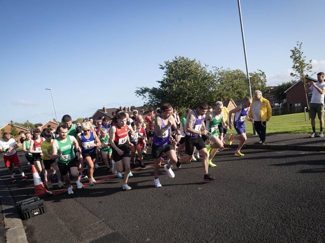 GALLIAGH FEILE 5K 2024. . . .The Deputy Mayor, Darren Guy gets the inaugural Galliagh Feile 5k started in Galliagh Park on Friday evening. (Photos: Jim McCafferty Photography)
