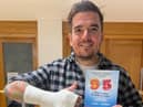 Michael Poole, who is the Director for Londonderry Musical Society's forthcoming production of 9 to 5 the Musical, broke his arm recently, but declared the show must go on.